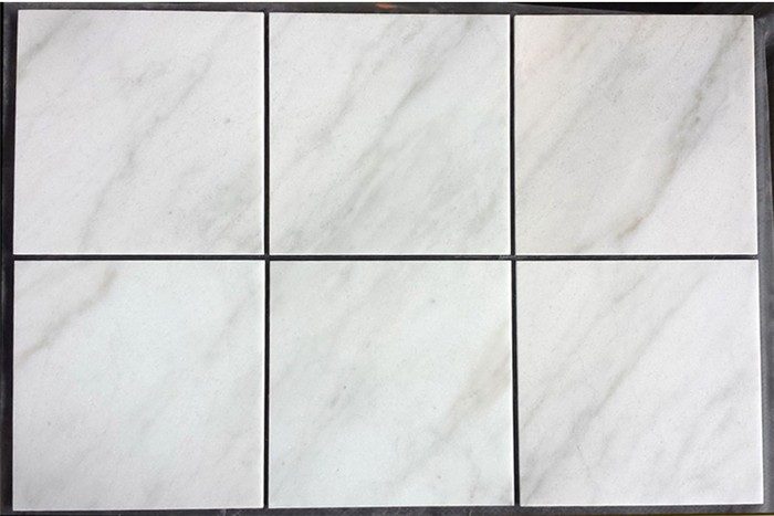 36x36 White Marble Tile, the company's own listing photograph