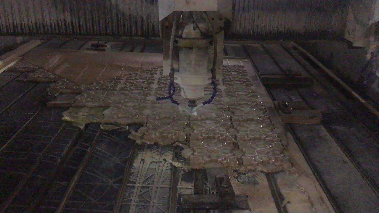 Poster frame from the company's own YouTube upload titled Unisun Stone Marble Quarry Carrara White Marble Quarry Guangxi White Marble Quarry
