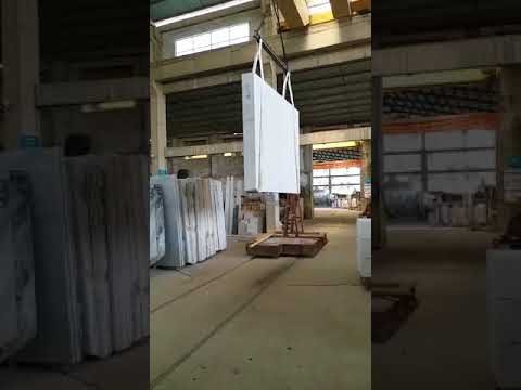 Poster frame from the company's own YouTube upload titled How to carry the white marble-Unisun Stone